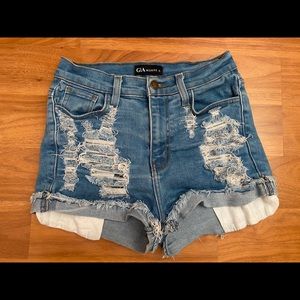 Distressed high waisted blue denim shorts